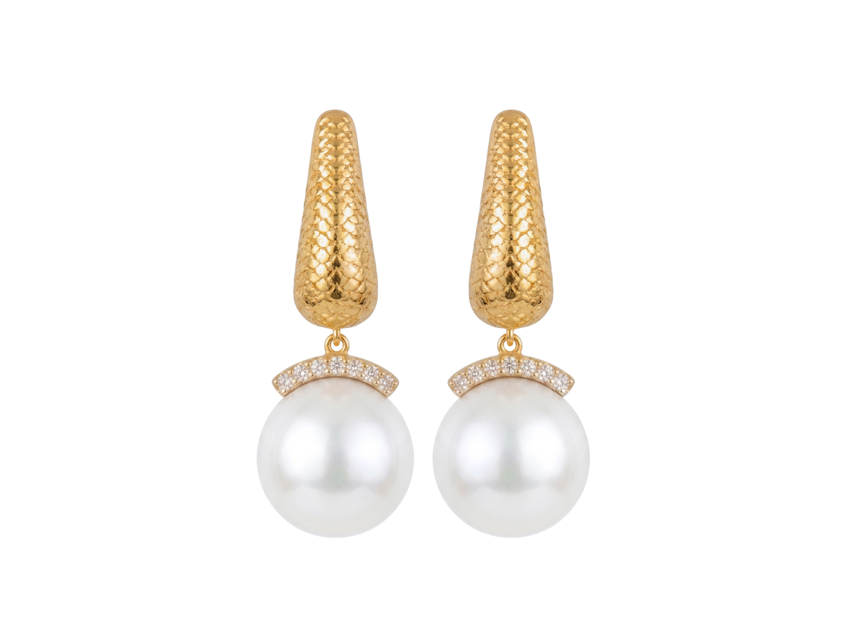 Colette Falchet Alma Mater drop earrings in 18k yellow gold, shown from the front with sculpted scale-pattern tops, white large South Sea pearls and natural diamond accents.